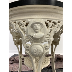 Cast iron circular pub table having relief cast portrait busts of Baden Powell above a cartouche with the initials BP, with later hardwood and formica top, 