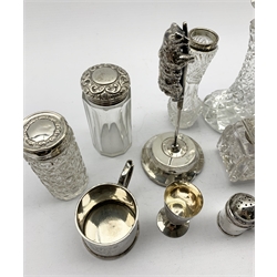 Silver paper spike  with an attached climbing bear, five silver mounted glass dressing table jars, pair of glass and silver inkwells and other items 