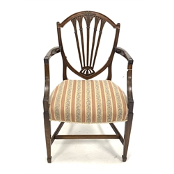 Early 19th century Hepplewhite style armchair, moulded framed shield back with lobe and reed carved upright slats, square tapering supports with spade feet joined by stretchers, seat height - 48cm