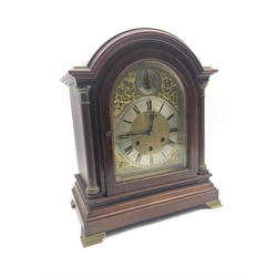 Early 20th century mahogany cased bracket clock, stepped arched pediment over domed bevel glazed door and turned pilasters, moulded plinth and brass bracket feet, the brass dial with Roman chapter ring, and chime/silent lever, triple train quarter chiming movement by 'Gustav Becker', movement back plate stamped 'P18, '2200246', with pendulum, H40cm, W33cm
