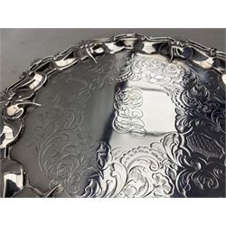 Victorian silver small salver engraved with leaves and monogram within a shell moulded border on shaped supports D22cm London 1853 Maker Daniel and Charles Houle 13.2oz