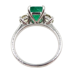 18ct white gold three stone emerald cut emerald and round brilliant cut diamond ring, emerald 1.92 carat, total diamond weight 0.81 carat, with World Gemological Institute certificate