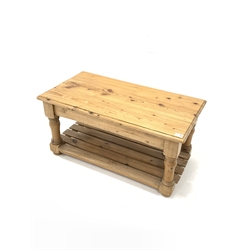20th century pine coffee table, moulded top raised on turned and block supports united by a slatted under tier