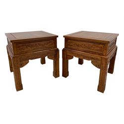 Pair Chinese Imperial style hardwood lamp or side tables, panelled square form, carved with foliate motifs and trailing geometric patterns, on square supports