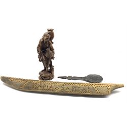 African spoon with incised bowl L33cm, Samoan model carved wood canoe inscribed 'Apia Samoa' L81cm and a carved Chinese figure