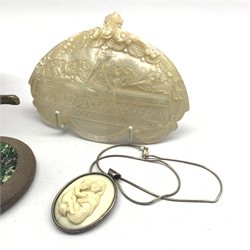  19th century abalone shell carved with a scene of the Last Supper, W14cm, 19th century ivory and silver mounted pendant carved in relief with Madonna and Child, early 19th century mahogany tea caddy and brass model of a bear on match striker style base   