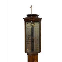 A  20th century bulb cistern stick barometer in an earlier styled case, with a convex stepped pediment above a glazed front and engraved register plate, enclosed mercury tube measuring barometric pressure from 27 to 31 inches with corresponding predictions, rack and pinion vernier with adjustment disc, ebonised urn shaped cistern cover to the cavetto moulded base with a brass cistern screw, register plate inscribed “R N Desterro, Lisbon”
