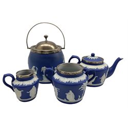 Wedgwood Jasperware biscuit barrel with silver mount and cover, Birmingham 1914, together with an Adams Jasperware silver mounted three piece tea set (4)