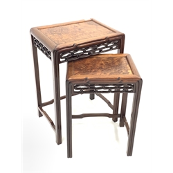Nest of two Chinese hardwood occasional tables, with figured top over pierced carved frieze, moulded supports united by stretchers, W42cm D30cm H60cm (max)
