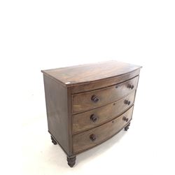 Victorian figured mahogany bow front chest fitted with three drawers , raised on turned supports W109cm, H98cm, D57cm