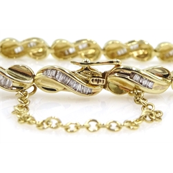 Gold baguette diamond link bracelet, stamped 14K