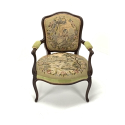 French style walnut open armchair, with needlework upholstered seat and back, raised on moulded cabriole supports, W67cm