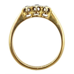 Gold three stone diamond ring, illusion set, stamped 18ct