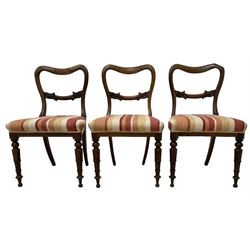 Set of six Victorian rosewood dining chairs, foliate carved centre rail over striped upholstered seat, raised on turned and lapped carved supports