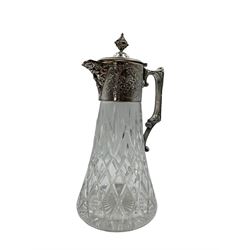 Victorian style silver mounted cut glass claret jug, the tapered diamond pattern clear glass body by Atlantis crystal with floral embossed silver mount, mask spout and handle, hallmarked W W, London 1994, H28.5cm
