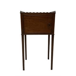 George III mahogany bedside cabinet, three-quarter raised gallery back with scalloped edge, fitted with single cupboard with cockbeaded front, raised on square tapering supports