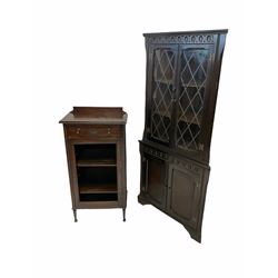 Early 20th century oak corner cupboard, together with an oak sheet music cabinet