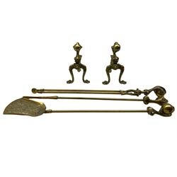 Pair of brass fire dogs modelled as talons with ornate decoration and feet together with matching fire companion set also modelled with talons (5)