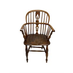19th century low back Windsor armchair, the spindle and splat back over elm seat, raised on turned supports, united by a stretcher 