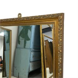 Gilt framed rectangular mirror, the frame decorated with stylised foliate band and beaded inner slip, plain mirror plate 
Provenance: From the Estate of the late Dowager Lady St Oswald