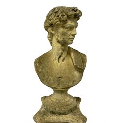 Composite stone bust, modelled after Michelangelo's David, on a Corinthian column pedestal