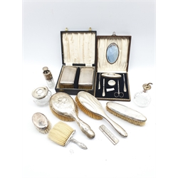 Pair of gentlemans engine turned silver backed hair brushes Birmingham 1958 with inscription, cased, set of silver manicure implements in case and a number of silver backed brushes, silver mounted hair tidy, two silver mounted atomisers etc