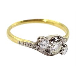 18ct gold three round brilliant cut diamond crossover ring, stamped, total diamond weight approx 0.35 carat