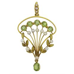 Edwardian oval peridot and split pearl pendant, stamped 15ct