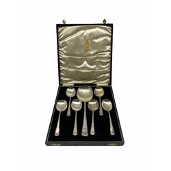 Cased set of six silver dessert spoons and serving spoon with reeded stems Birmingham 1933 Maker A J Bailey 8.8oz