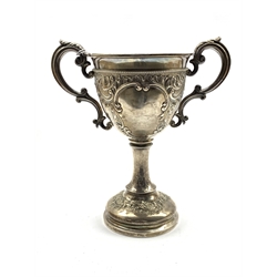 Victorian silver two handled trophy engraved with the crest of The Prince of Wales Own Regt. formerly West Yorkshire Regt. with scroll handles and pedestal foot H27cm Chester 1893 Maker James Deakin 20oz