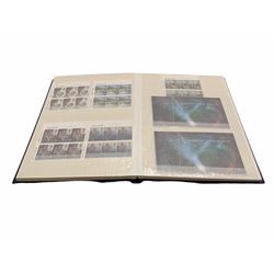 Queen Elizabeth II mint decimal stamps, housed in a stockbook, face value of usable postage approximately 200 GBP