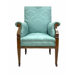 Edwardian mahogany armchair, the show frame with boxwood and satinwood inlay, upholstered in blue floral damask silk, raised on square tapered supports with brass and ceramic castors W68cm