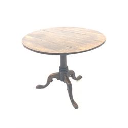 Georgian oak circular tilt top occasional table, raised on turned column and triple splay supports D92cm