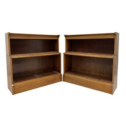 Bakers - Pair of 20th century mahogany two tier open bookcases, raised on plinth base 