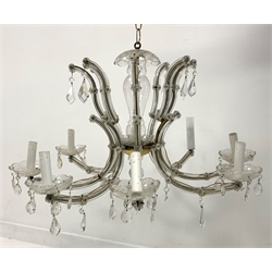  20th century eight branch glass and gilt metal chandelier with prism glass drops H44cm and a matching set of two branch wall lights  