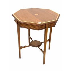 Edwardian inlaid mahogany centre table, the octagonal top with moulded edge raised on square tapered supports united by under tier W69cm