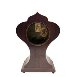 Early 20th century Art Nouveau period 8-day French timepiece mantel clock - Mahogany case with inlaid decoration on a shallow plinth raised on bun feet, enamel dial with Arabic numerals,  minute track and steel spade hands, replacement lever platform escapement, wound and set from the rear. 