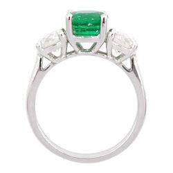 18ct white gold three stone emerald and round brilliant cut diamond ring, hallmarked, total diamond weight approx 1.30 carat, emerald approx 1.35 carat