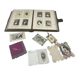 Early 20th century photo album, bound in leather containing 10 portraits, decorated with bird illustrations, together with various items of ephemera including Royal Signals embroidered silk handkerchief etc.