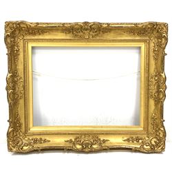 Early 20th century swept gilt gesso frame, aperture 50cm x 67cm (20