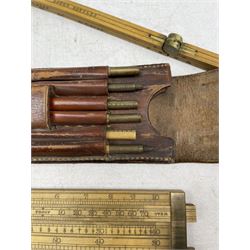 Folding barrel measure by Buss of 48 Hatton Garden London and another brewery measure housed in a leather case (2)