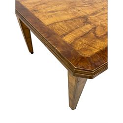 20th century spalted elm telescopic extending dining table, banded and moulded rectangular top with canted corners, four additional leaves, on square tapering supports with brass and ceramic castors, with winder