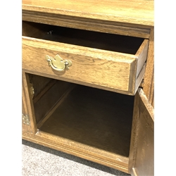 20th century oak dresser, top section fitted with cupboards and open shelves, three panelled cupboards and a drawer under, raised on stile supports, W169cm, H190cm, D54cm