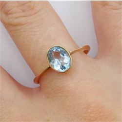 Early 20th century rose gold milgrain set single stone oval aquamarine ring, stamped 9ct, 