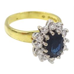 18ct gold oval sapphire and round brilliant cut diamond cluster ring, London 1974