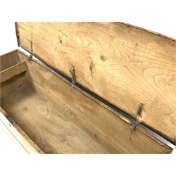 Elm blanket box, hinged lid revealing plain interior, raised on bracket supports