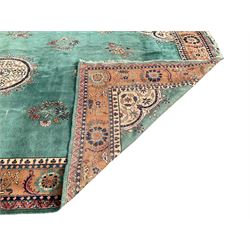 Large Antique Persian carpet, jade green ground with brown border