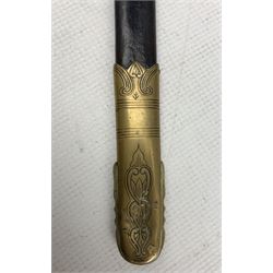 George V period 1871 pattern Royal Navy Midshipmans Dirk by Gieves & Son, Portsmouth and Devonport, straight single edged blade engraved with Royal Cypher and crowned anchor, wire wound fishskin grip, brass hilt with lions head pommel, brass mounted leather scabbard engrave with initials 'J.B.H., blade length 45cm