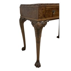 Queen Anne design figured walnut side table, shaped rectangular top with foliate moulded edge, fitted with single drawer, raised on cabriole supports with shell and acanthus carved knees and hairy paw feet