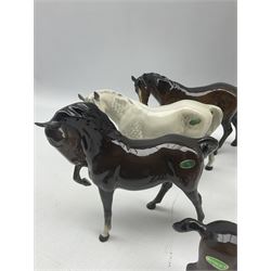 Eight Beswick horses including Grey and Brown Mares 976, Brown Horse 1549, first version, Skewbald Pinto Pony 1373 second version, Palomino horse and foal, Dartmoor Pony and a brown foal (8)